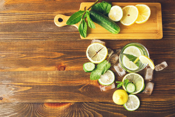 Light, refreshing drink of lime, lemon and cucumber in a transparent glass