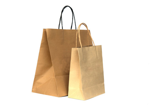 Recycled brown paper shopping bags isolated on white background
