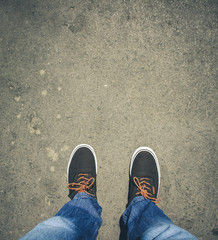 Top view from Young man with sneakers and jeans