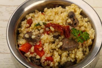 Bulgur with chicken hearts