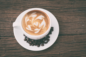 Coffee cup and beans