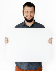 Happiness man holding blank banner studio portrait