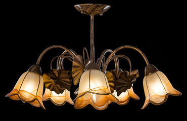 Chandelier light in interior on black background
