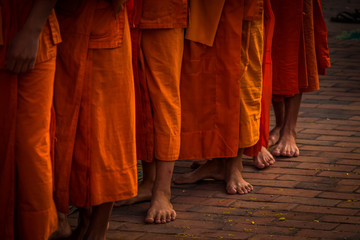 Bhuddist monks during alms processiong in Luang Pranbang, Laos