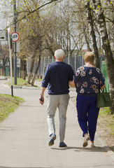 couple walks down the street