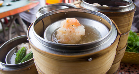 Dim sum in bamboo steamer- Chinese cuisine