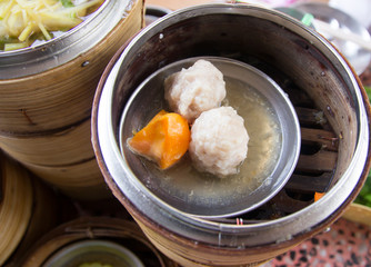 Dim sum in bamboo steamer- Chinese cuisine