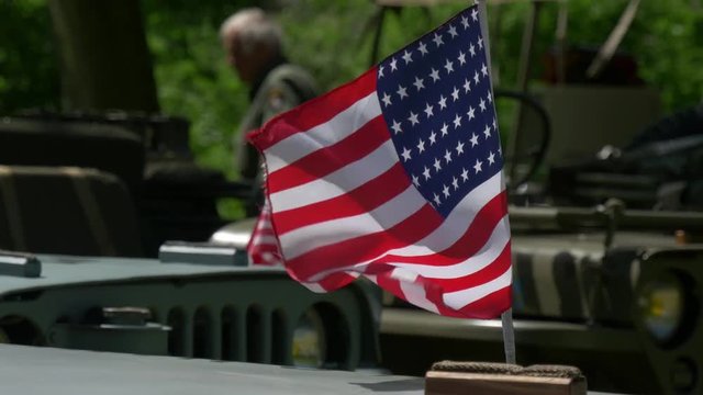 American flag on an old military vehicle