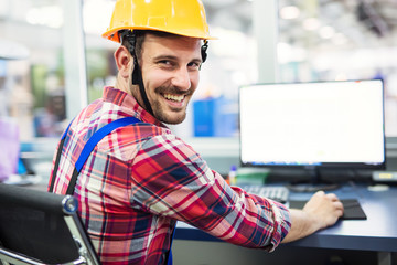 industrial factory employee working in metal manufacturing industry