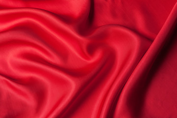 Red cloth waves background texture