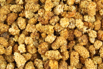 dried white mulberry fruits closeup food background texture