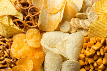 Salty snacks. Pretzels, chips, crackers - obrazy, fototapety, plakaty