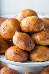 Fresh baked french brioches on white background
