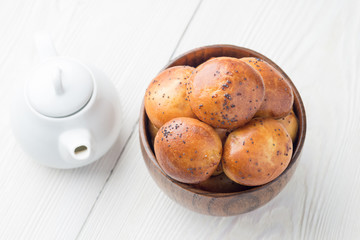Fresh baked french brioches on white background