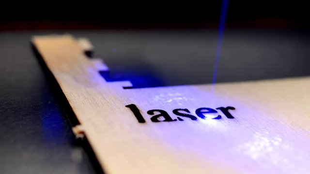 Laser machine operation during engraving