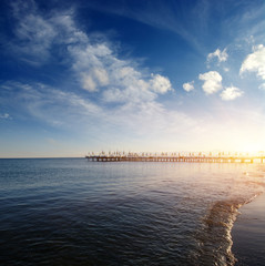 Obraz premium Blue sea on sunset