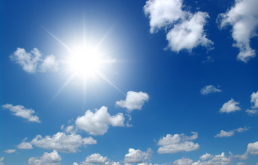 Obraz na płótnie Canvas sun on blue sky