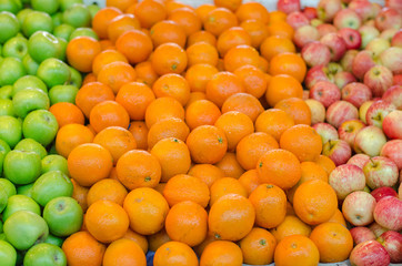 beautiful color combination, lemon and green apple background display at market stall.