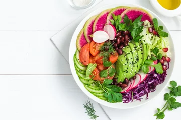 Fotobehang  Avocado, red bean, tomato, cucumber, red cabbage  and watermelon radish  vegetables salad © anna_shepulova