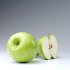 Green apples on a white background