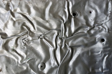 Crumpled metal texture background. Science fiction vintage style