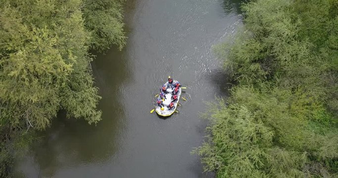 Boat rafting on river. Aerial view from a drone in Nera's Gorges, Romania (Cheile Nerei National Park)