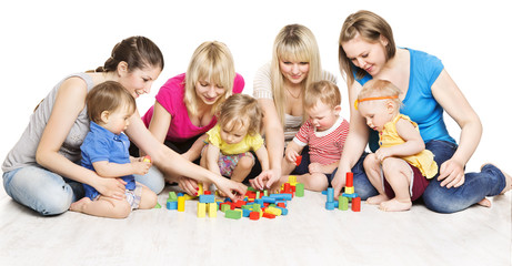 Mothers and Kids Group Playing Toys, Mother With Baby Play Building Blocks over White Background