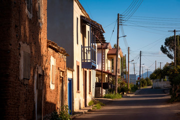 Obraz premium Charming narrow street in the vilage of Peristerona. Nicosia District, Cyprus