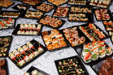 Buffet table with different snacks