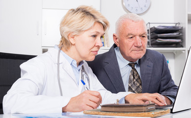 Female doctor with male client