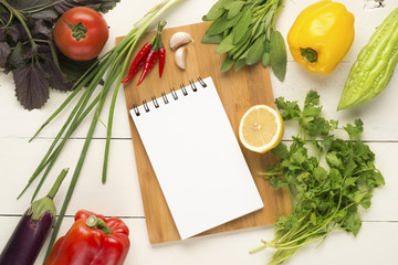 Various fruits and vegetables with white paper card. Flat lay. Food concept.