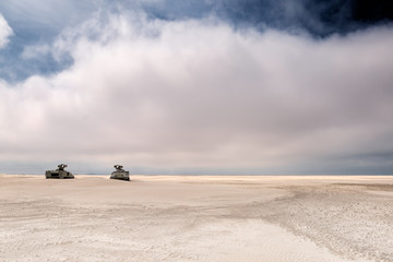 Militairy tanks destructed on beach