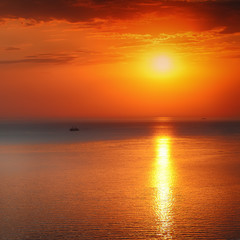 Panoramic dramatic sunset sky over sea at dusk