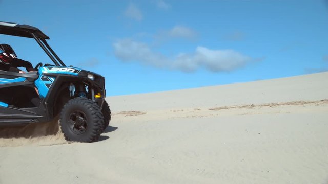 Super slow motion shot of ATV driving on sand dunes, Oregon, shot with Phantom Flex 