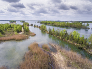 Lake and forest during spring time. View from above. Pogoria IV in Dabrowa Gornicza, Poland.