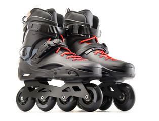 Pair of black inline skates isolated on white
