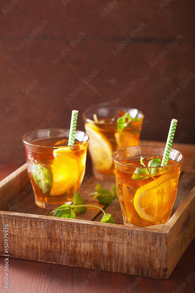 Canvas Prints ice tea with lemon and mint on dark rustic background