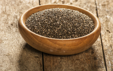 chia seeds close up on wood