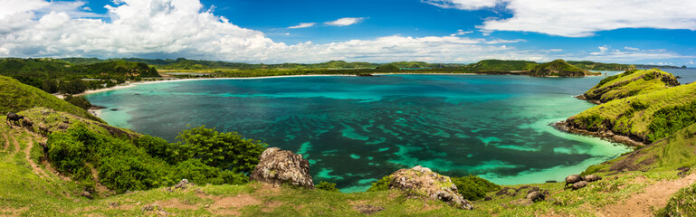 Panoramic view of the azure coral bay and pasture slope, Indonesia
