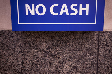 The Words No Cash Written On A Sign