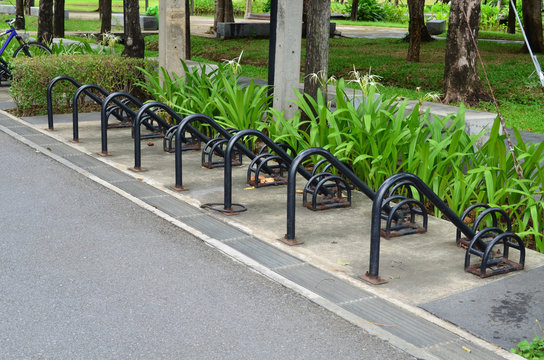 Empty bicycle parking lot in public garden