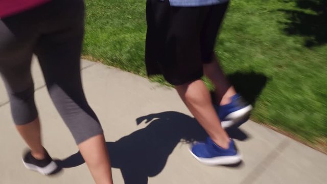 Couple running at park