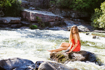 Outdoors portrait of attractive joyful smiling girl on tvavel holiday trip, sunny outdoors background