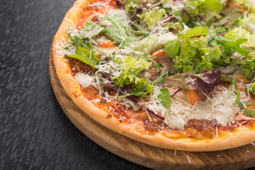 fresh pizza with salad
