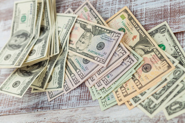 money isolated on a wooden background