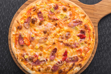 italian pizza with sausage and pepperoni