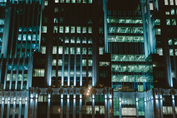 Night cityscape office building. Business blue background