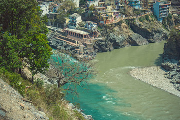 The confluence of two rivers of different colors in the town of Devprayag