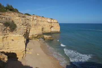 Fototapeta na wymiar Marinha beach with its beautiful cliffs scenery in Lagoa. Algarve, Portugal