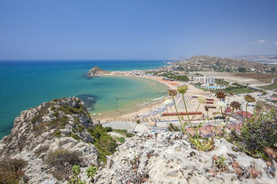 The cliffs frame the turquoise sea and the sandy beach of Licata, Province of Agrigento, Sicily, Mediterranean